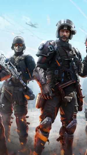 Soldiers in tactical gear with firearms
