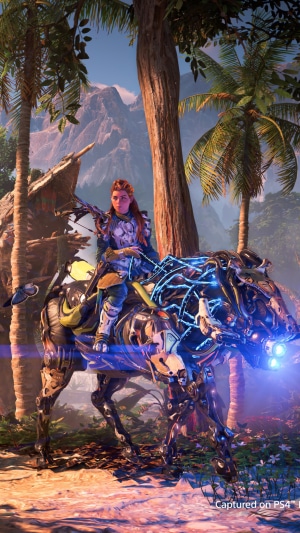 Aloy from Horizon Forbidden West riding a machine