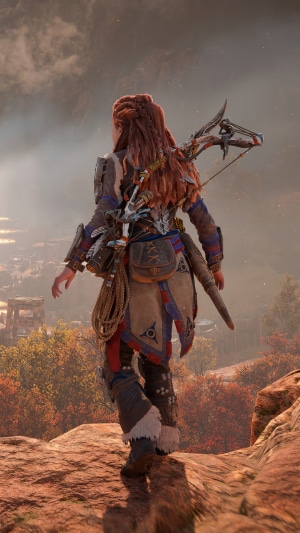 Aloy from Horizon Forbidden West on a rocky outcrop