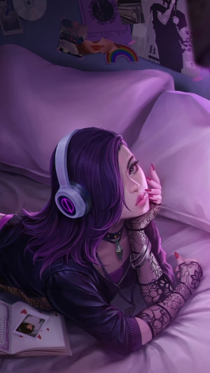 Girl with headphones in a bedroom