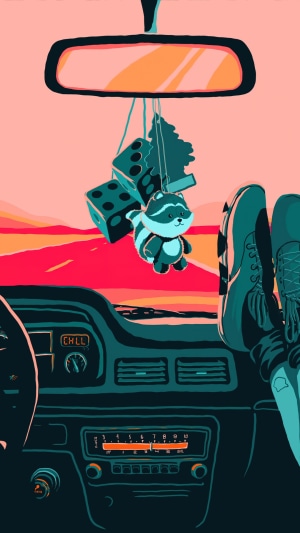 Car interior with dashboard, rearview mirror, and air fresheners