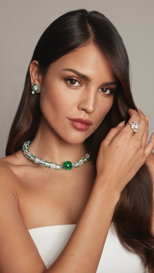 Eiza Gonzalez wearing emerald and diamond jewelry
