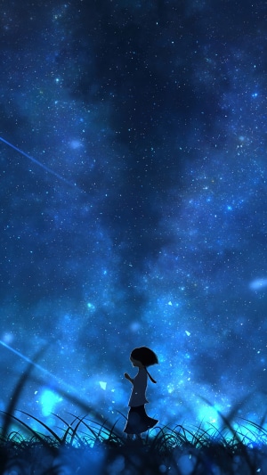 Girl looking at a starry night sky