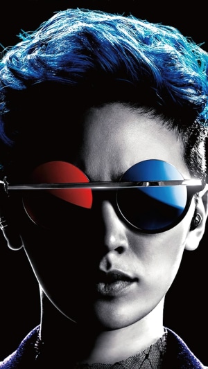 Person with blue hair and 3D glasses