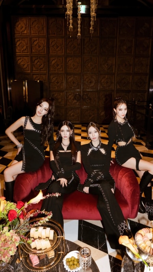 T-ara members posing on a couch