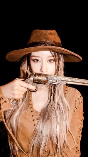 Park Ji Yeon holding a pistol