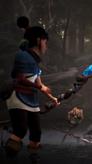 Kena from Kena: Bridge of Spirits holding a staff