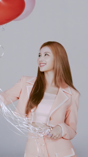 Sana from TWICE in Pink Outfit Holding Balloons