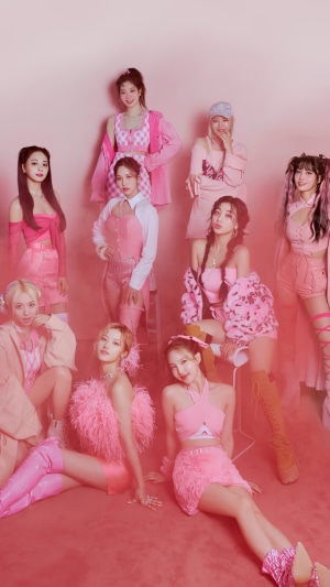 TWICE Kpop group members in pink outfits