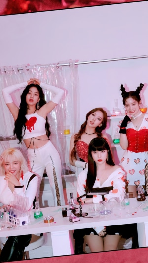 TWICE members in a laboratory setting