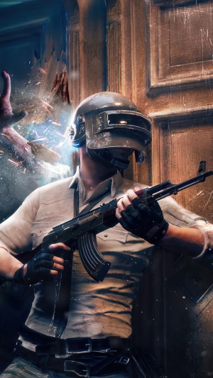 PlayerUnknown's Battlegrounds character with assault rifle