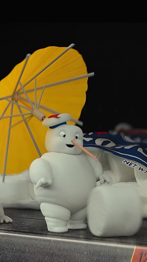 Stay Puft Marshmallow Man from Ghostbusters with umbrella