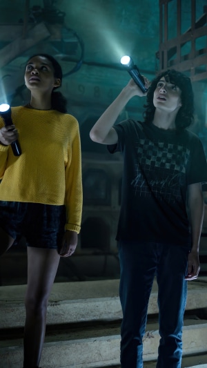 Two kids with flashlights in Ghostbusters: Afterlife