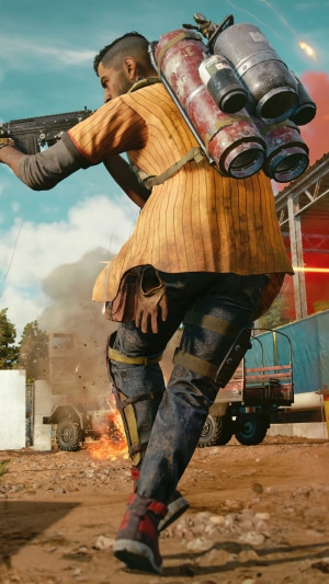 Man with flamethrower backpack firing gun