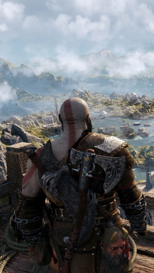 Kratos from God of War Ragnarok overlooking a landscape