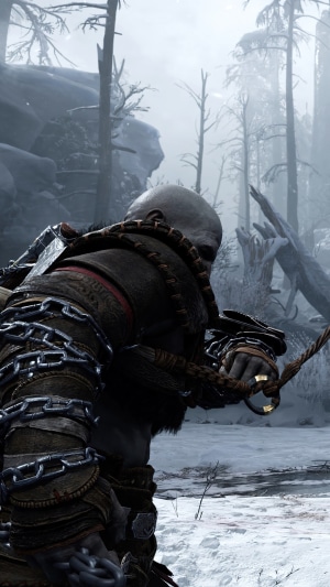 Kratos from God of War Ragnarok in a snowy forest