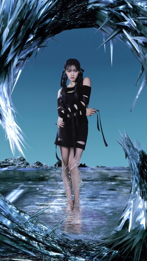 Giselle from Aespa in a black ripped dress