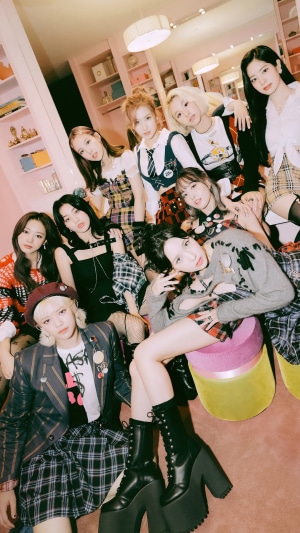 TWICE members posing for 'The Feels' concept photo