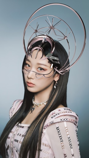 Giselle from Aespa wearing a futuristic headdress