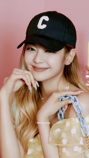 Lia from ITZY wearing a black cap