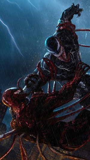 Venom and Carnage fighting in the rain