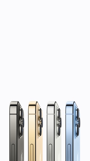 Four iPhones in different colors lined up