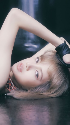 Lisa from BLACKPINK lying down