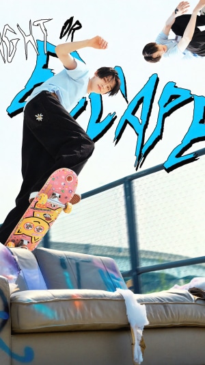 Yeonjun from TXT performing on a skateboard