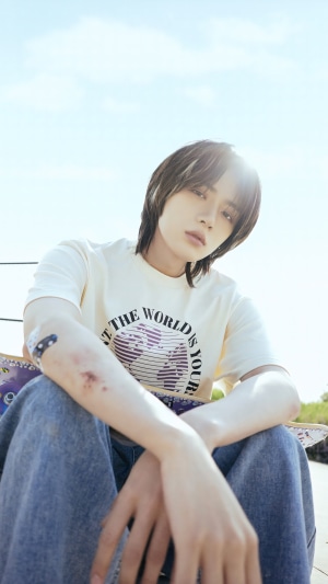 Beomgyu from TXT with skateboard