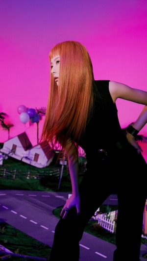 Seulgi from Red Velvet in a surreal landscape
