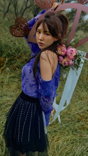 Wendy from Red Velvet in a field