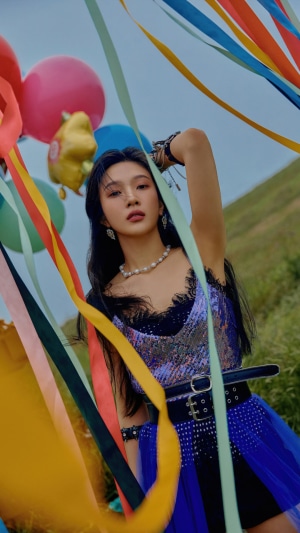 Joy from Red Velvet with balloons and ribbons