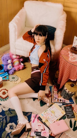 Wendy from Red Velvet sitting on the floor