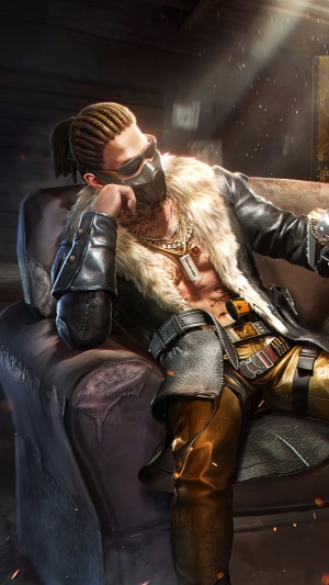Man with mask and chains sitting on couch