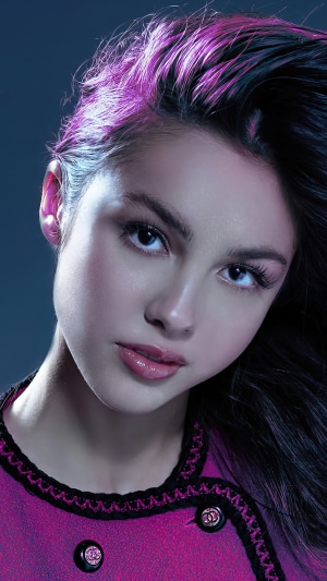 Olivia Rodrigo wearing a pink Chanel jacket