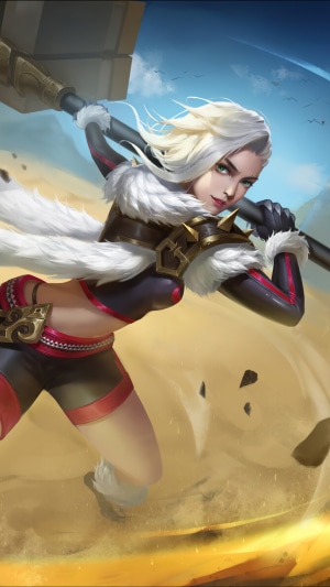 Warrior girl with hammer in a desert