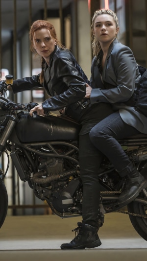 Natasha Romanoff and Yelena Belova on a motorcycle