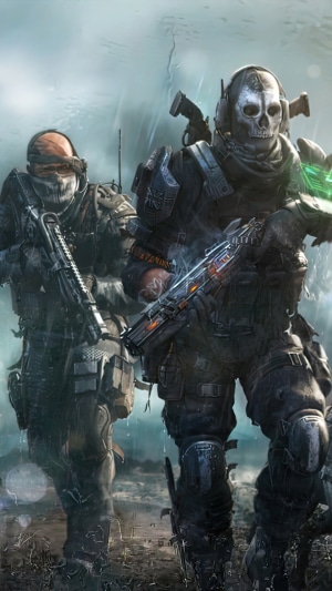 Two soldiers from Call of Duty Mobile in a rainy environment