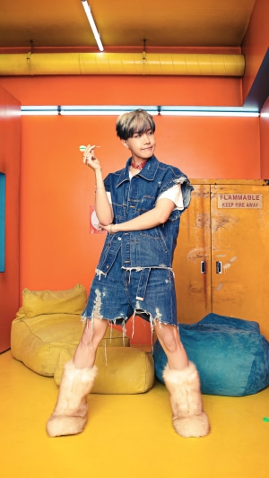 J-Hope from BTS holding a dart
