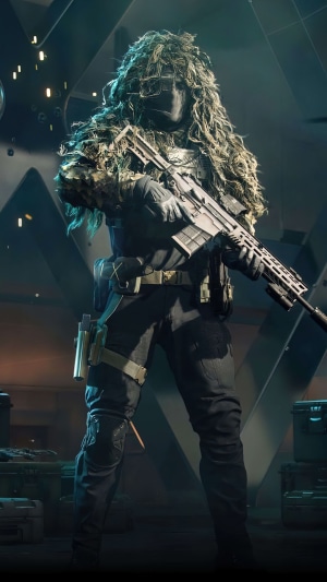 Soldier in ghillie suit holding a rifle in Battlefield 2042