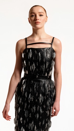 Phoebe Dynevor in a black dress