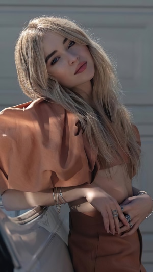 Sabrina Carpenter posing outdoors