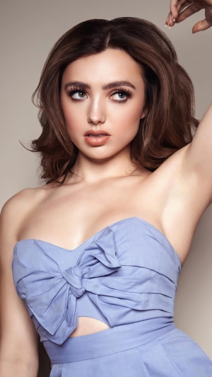 Peyton List in a blue strapless dress