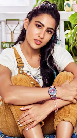 Sara Ali Khan wearing overalls and a watch