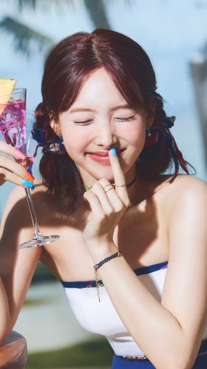 Nayeon from TWICE with a drink