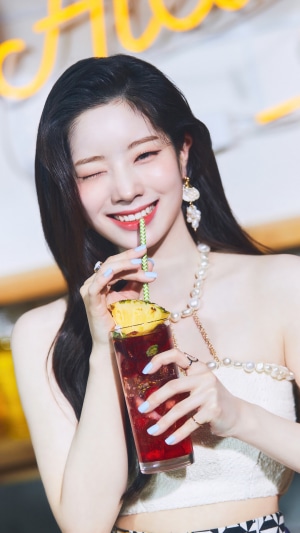 Dahyun from TWICE drinking a cocktail