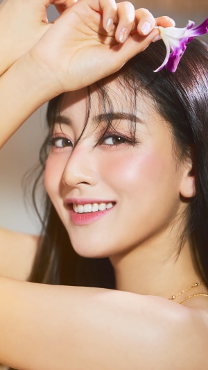 Jihyo from TWICE with a flower