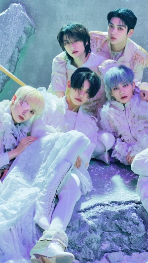 Tomorrow X Together members in white outfits