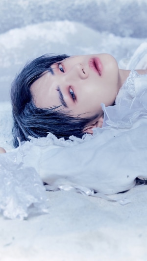 Yeonjun from TXT lying down