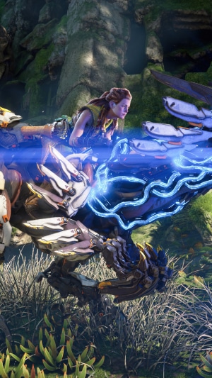 Aloy from Horizon Forbidden West riding a machine